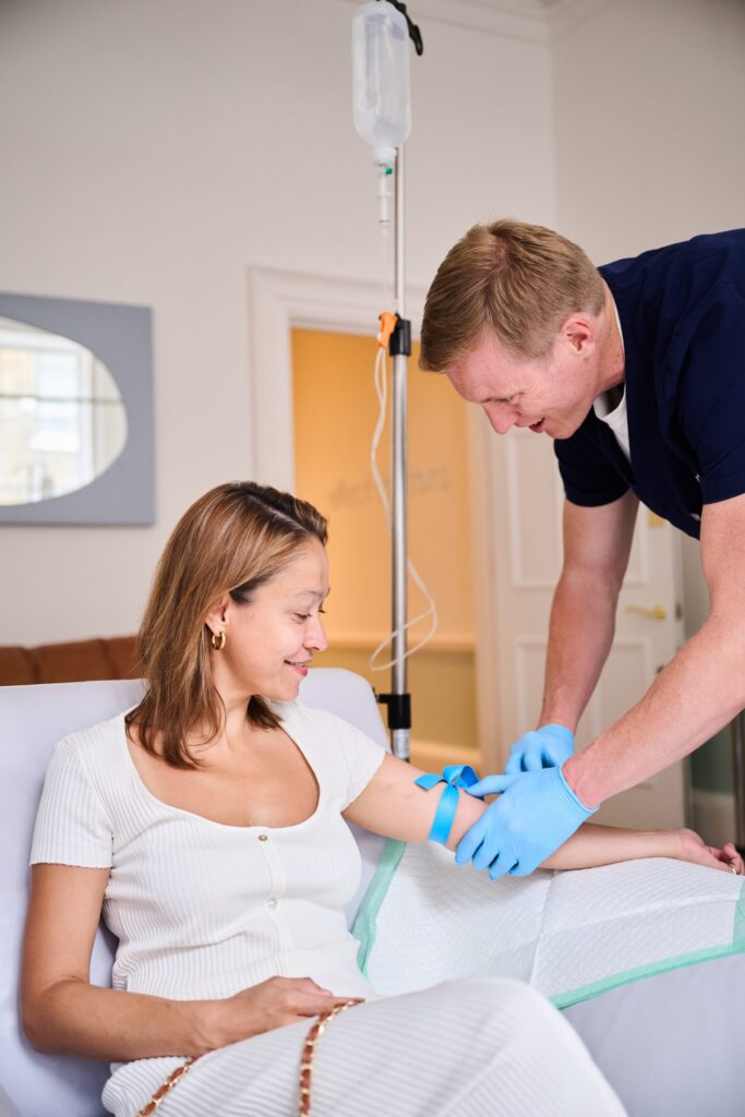 Patient sitting comfortably during an immunity IV infusion session